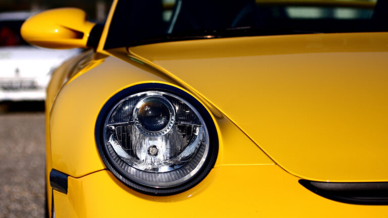 Image of a porche headlight.